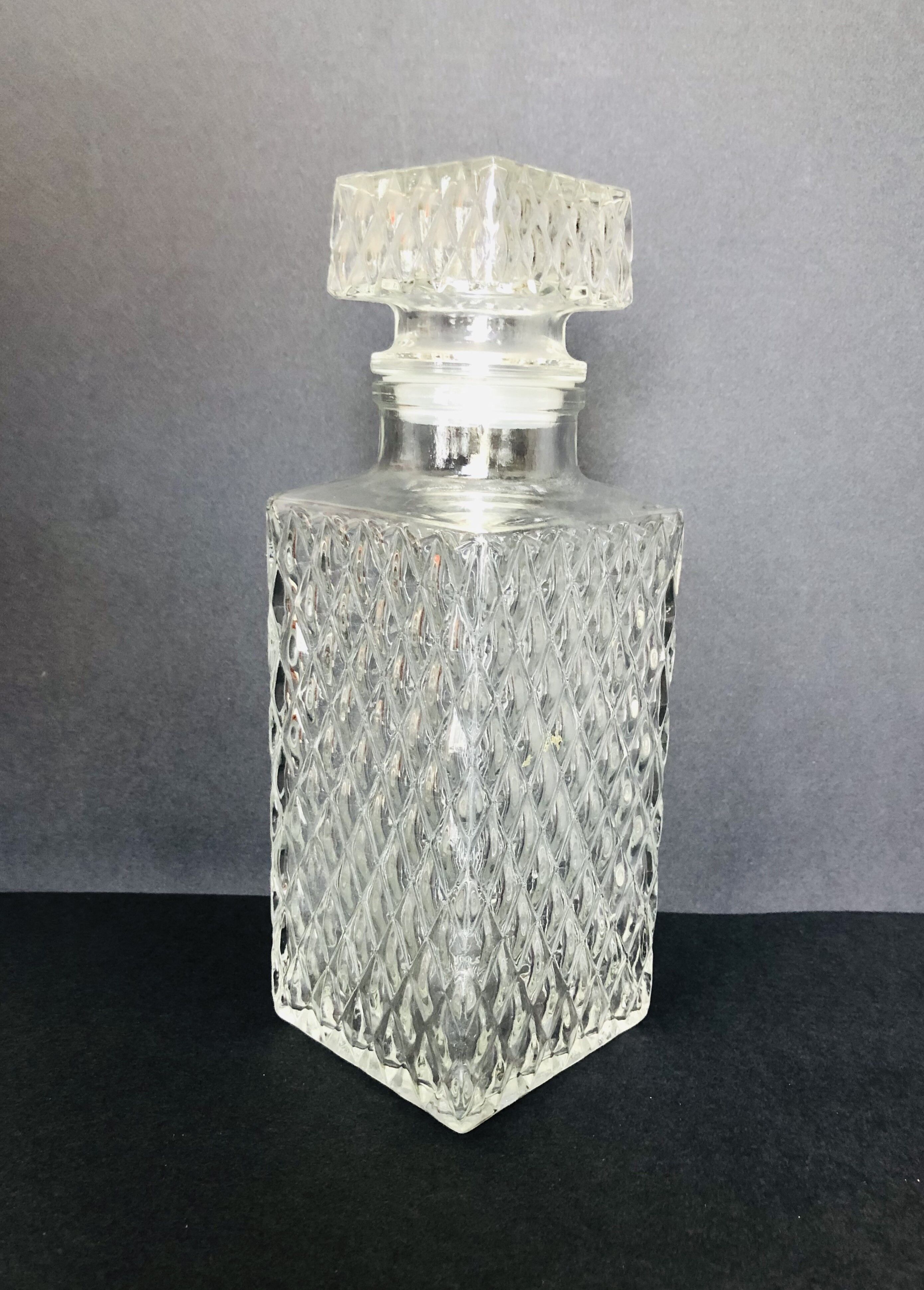Glass whiskey bottle