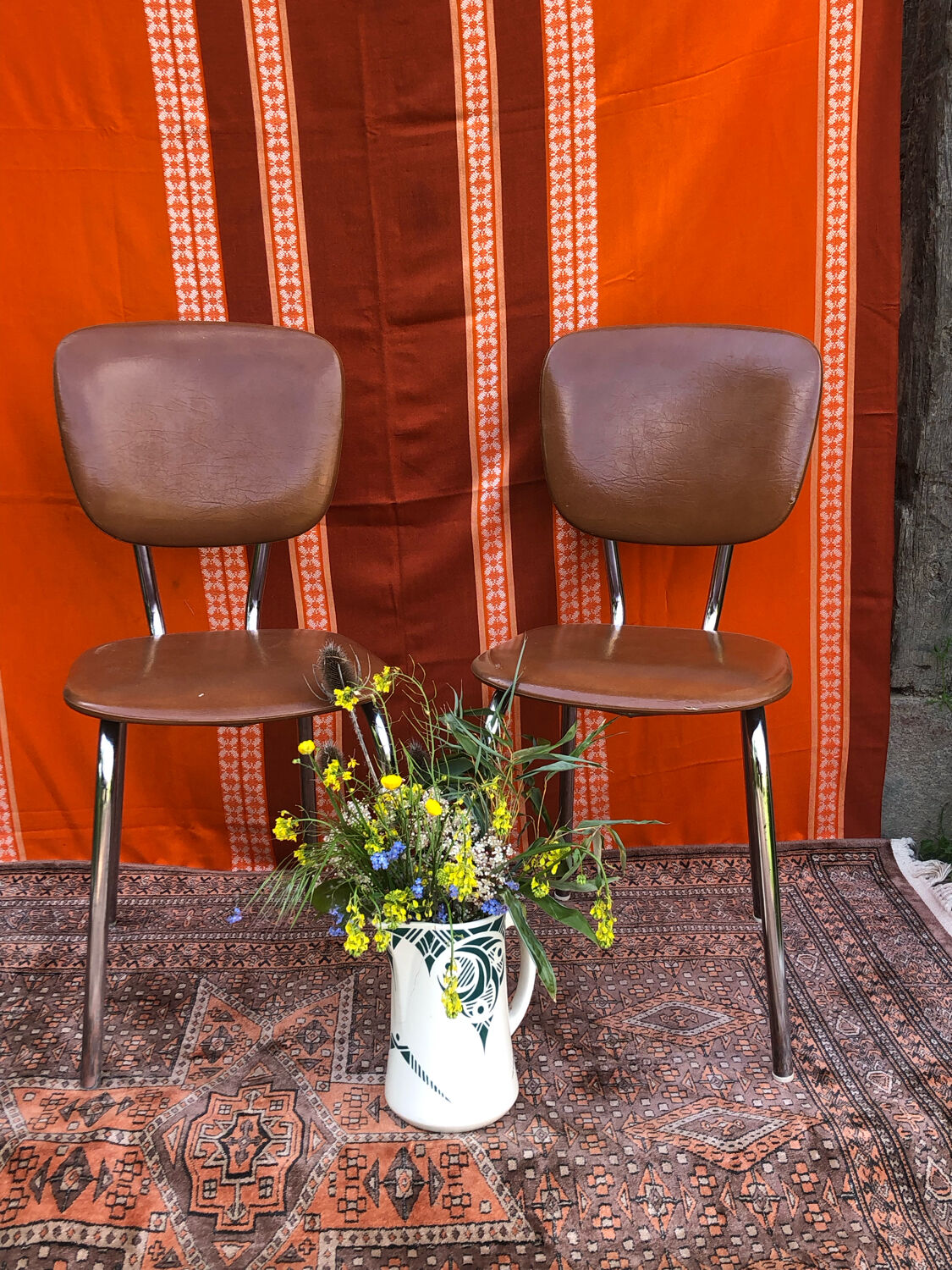 Pair of imitation leather chairs