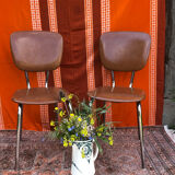 Paire de chaises en simili cuir