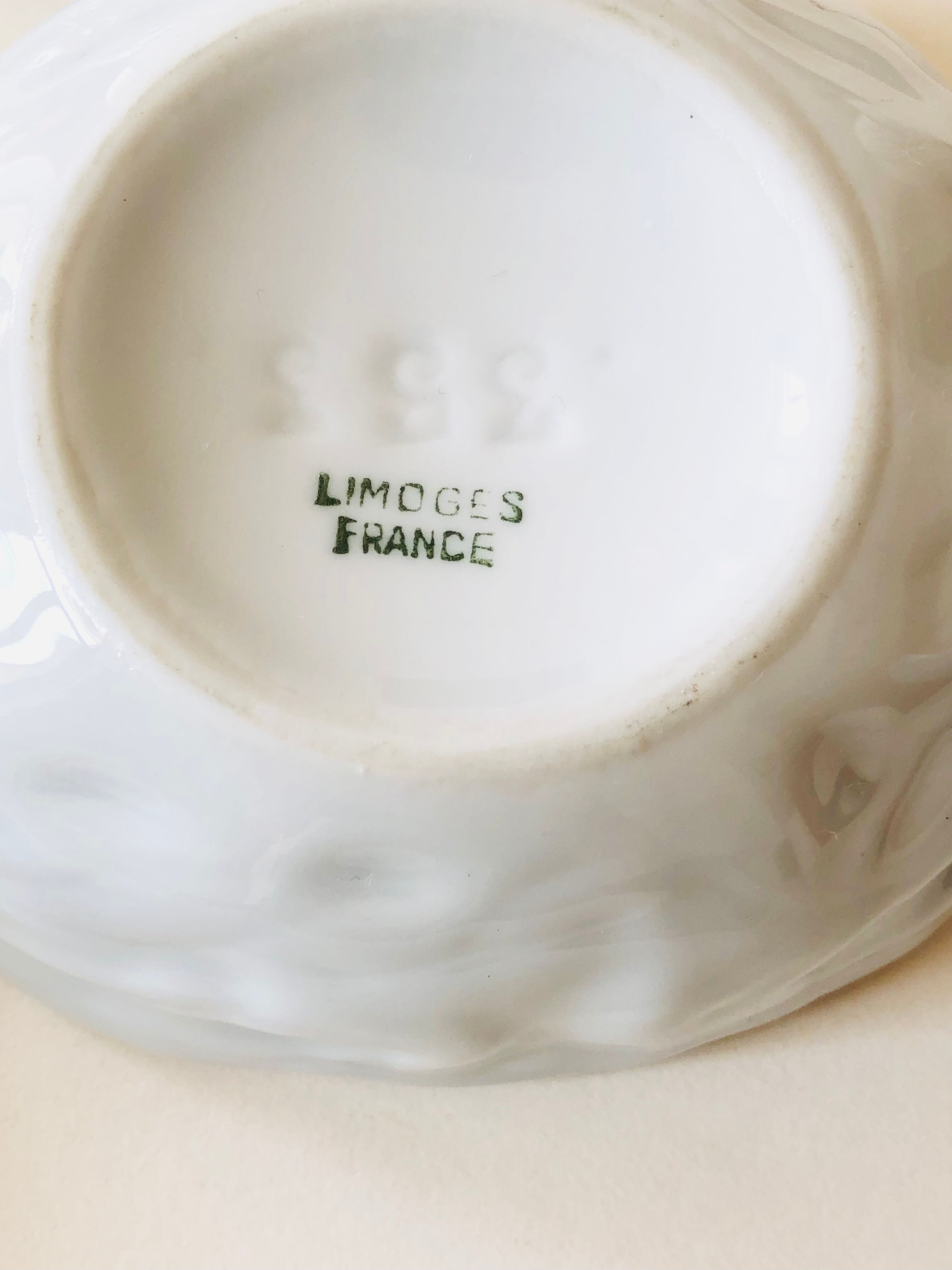 Pair of Limoges porcelain nut boxes