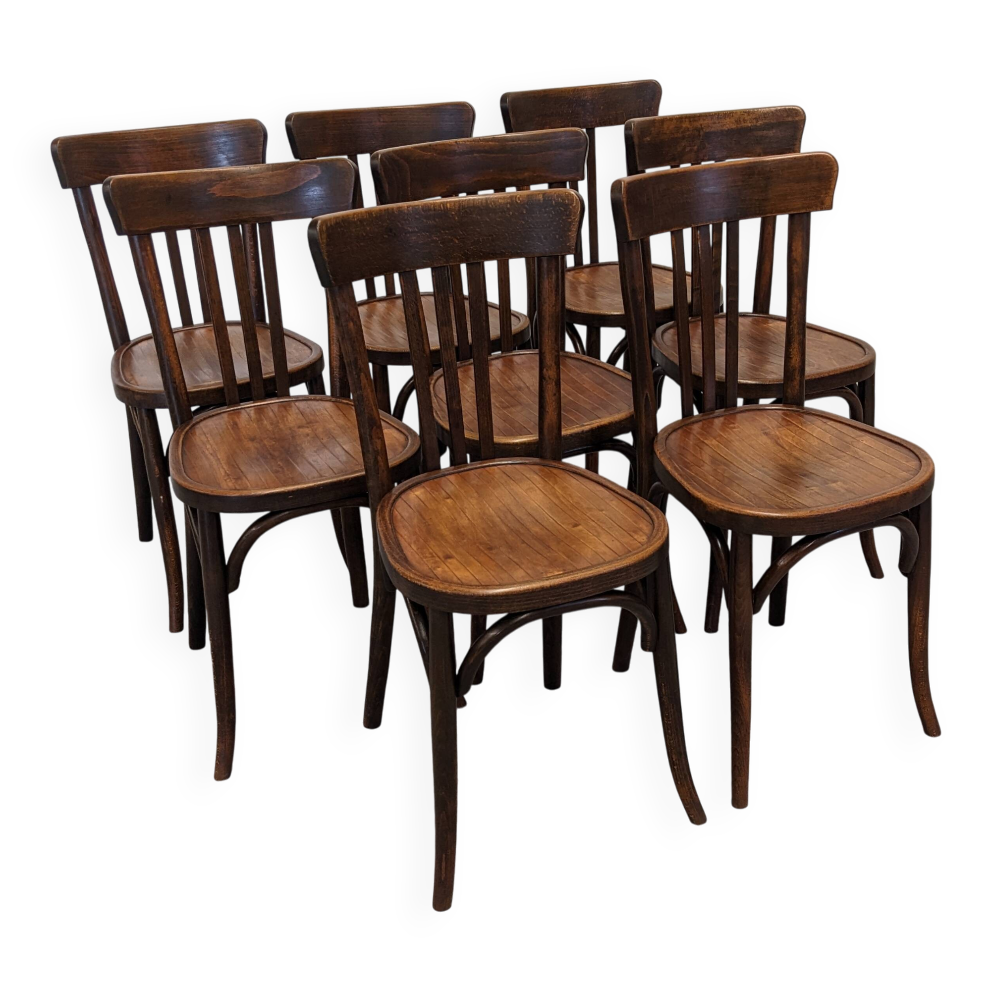 Set of 8 Baumann bistro chairs in bent beech, France circa 1930.