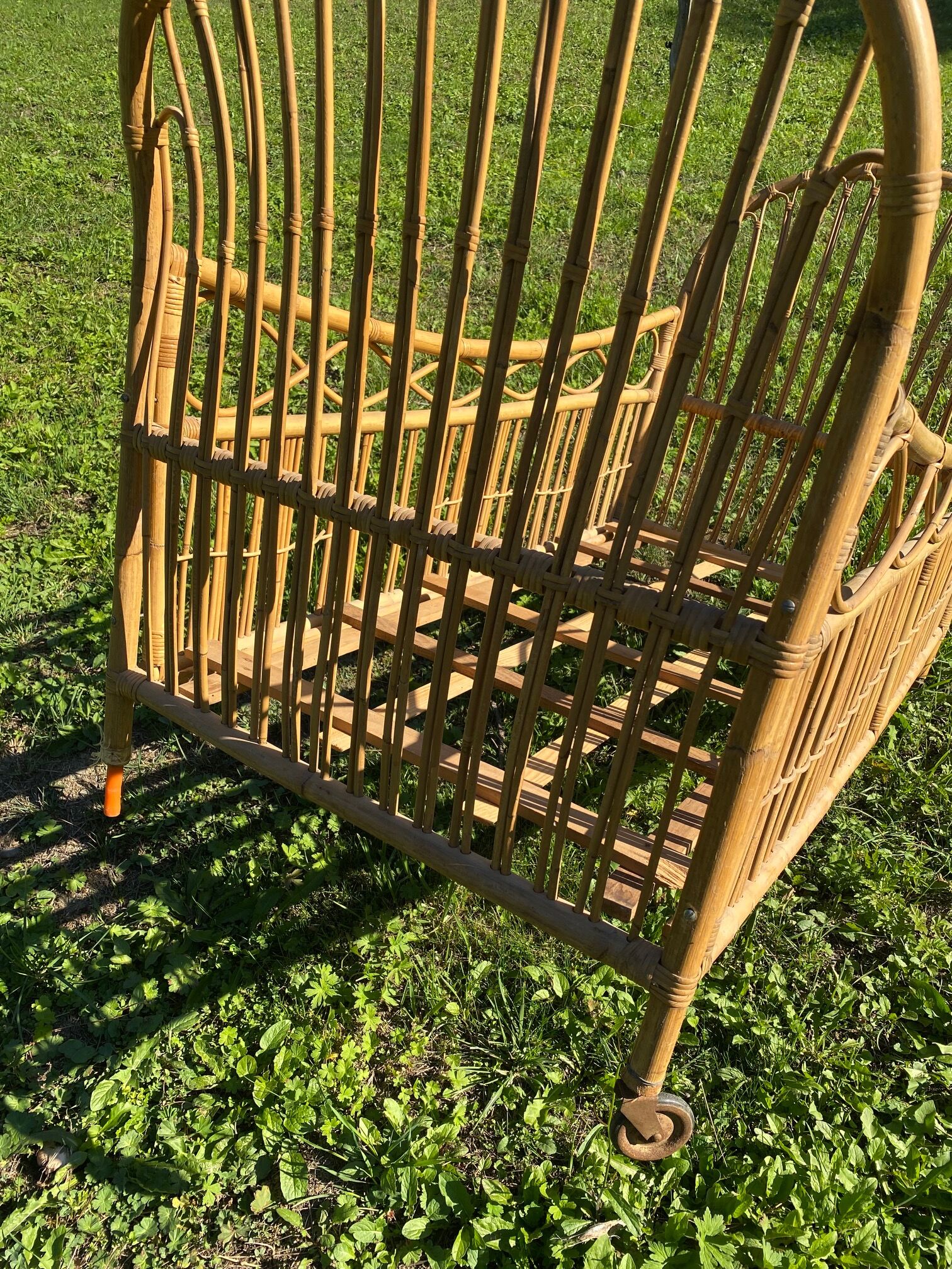 Children's bed in vintage rattan