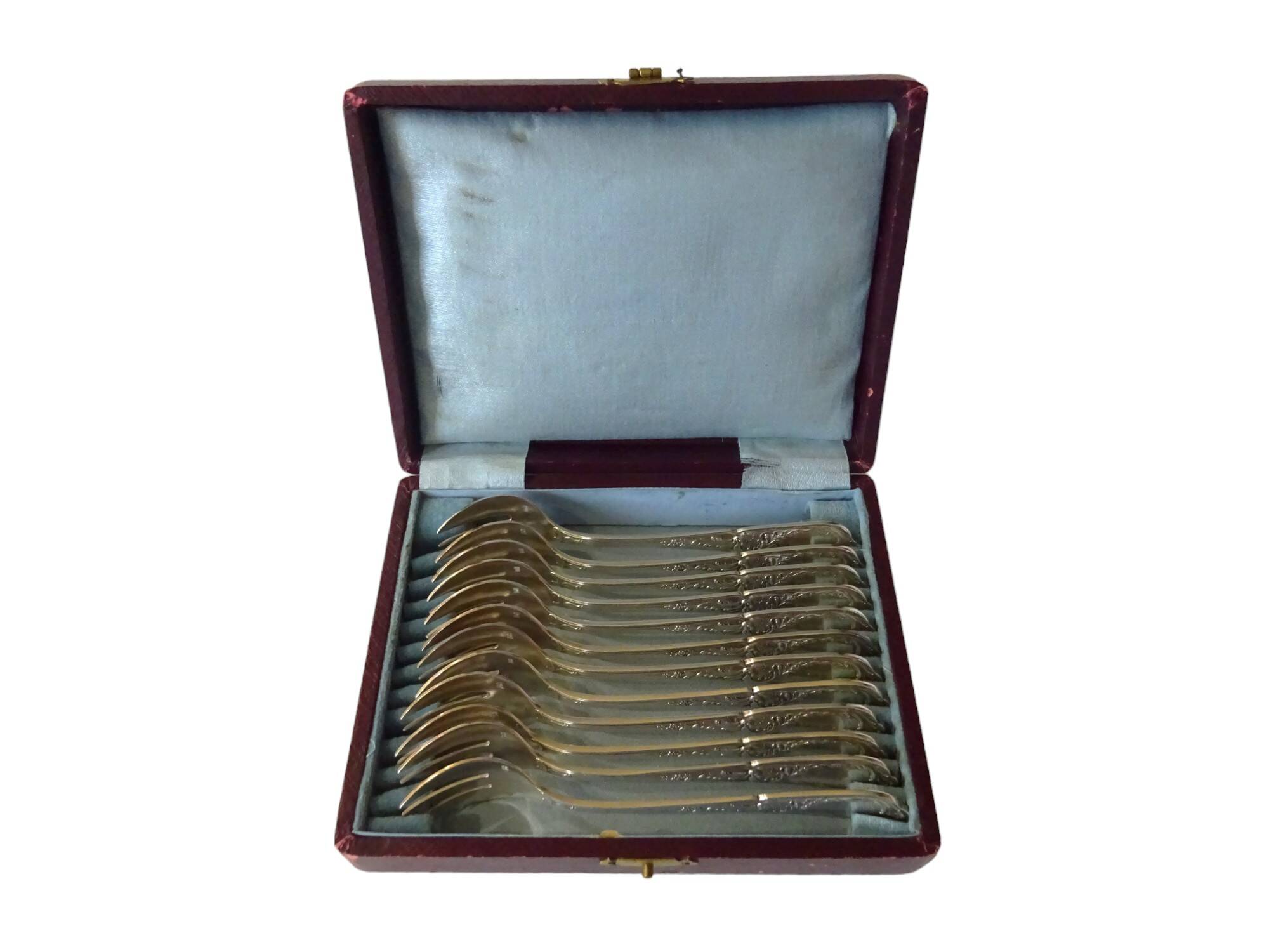 12 silver-plated oyster forks