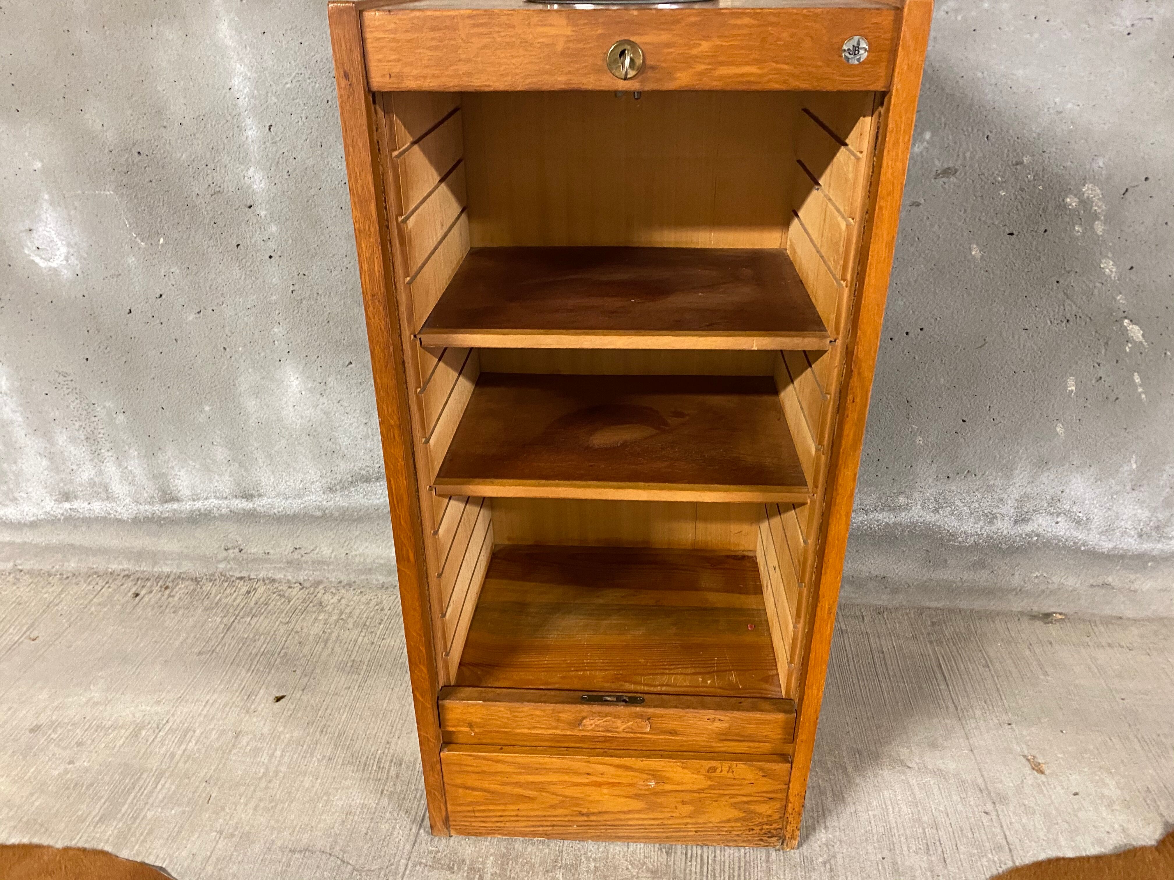 industrial furniture notary binder has vintage J-B curtain 1960S