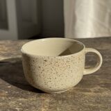 Set of 4 vintage speckled beige stoneware coffee cups.
