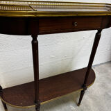 Louis XVI demi-moon console in wood and brass.