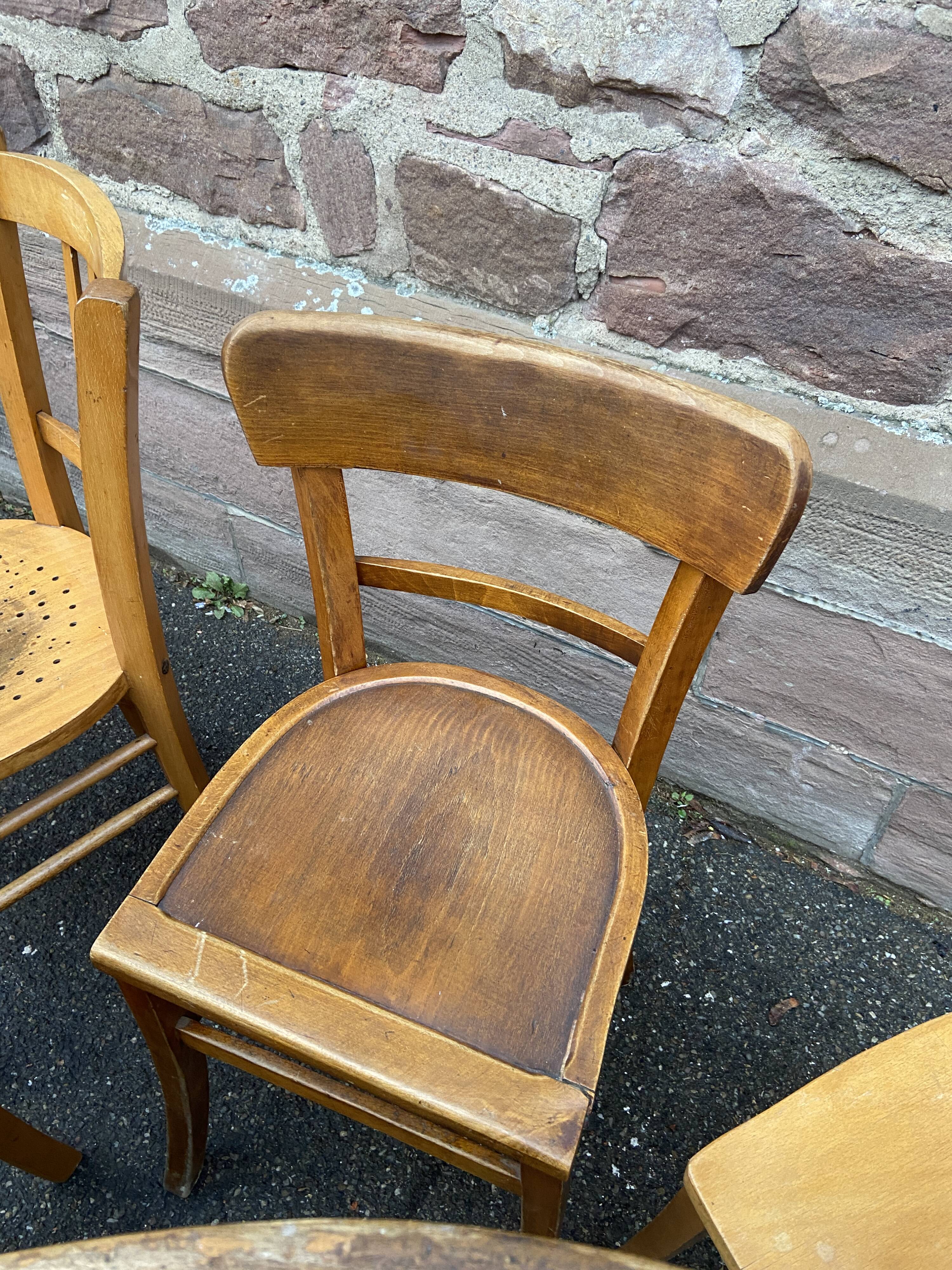 Set of vintage mismatched bistro chairs