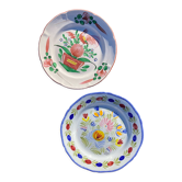 Two hand-painted earthenware plates