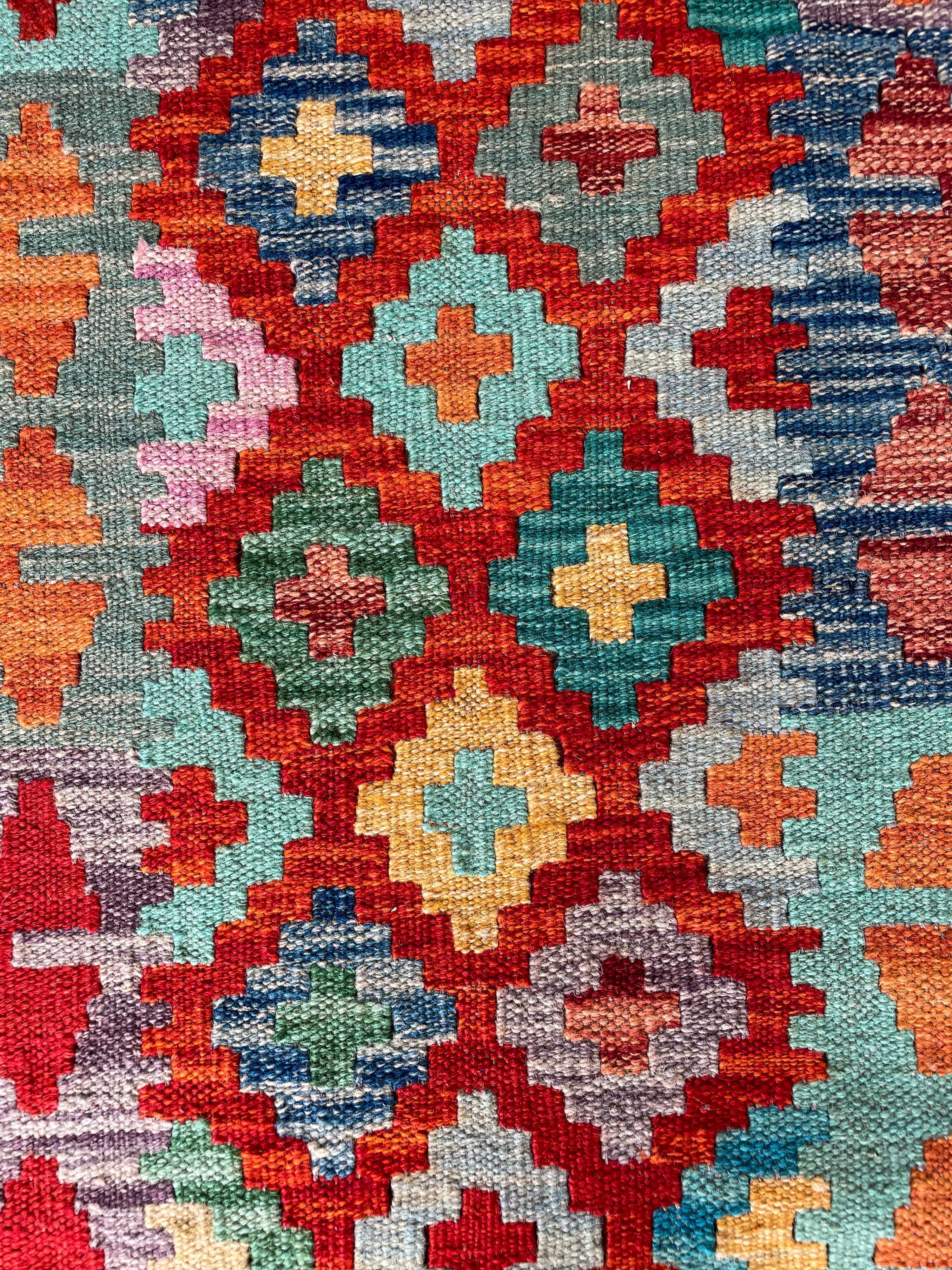 Afghan hallway kilim carpet colored red orange multicolor