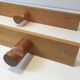 Charlotte Perriand, pair of fir wall coat racks, French work, around 1970
