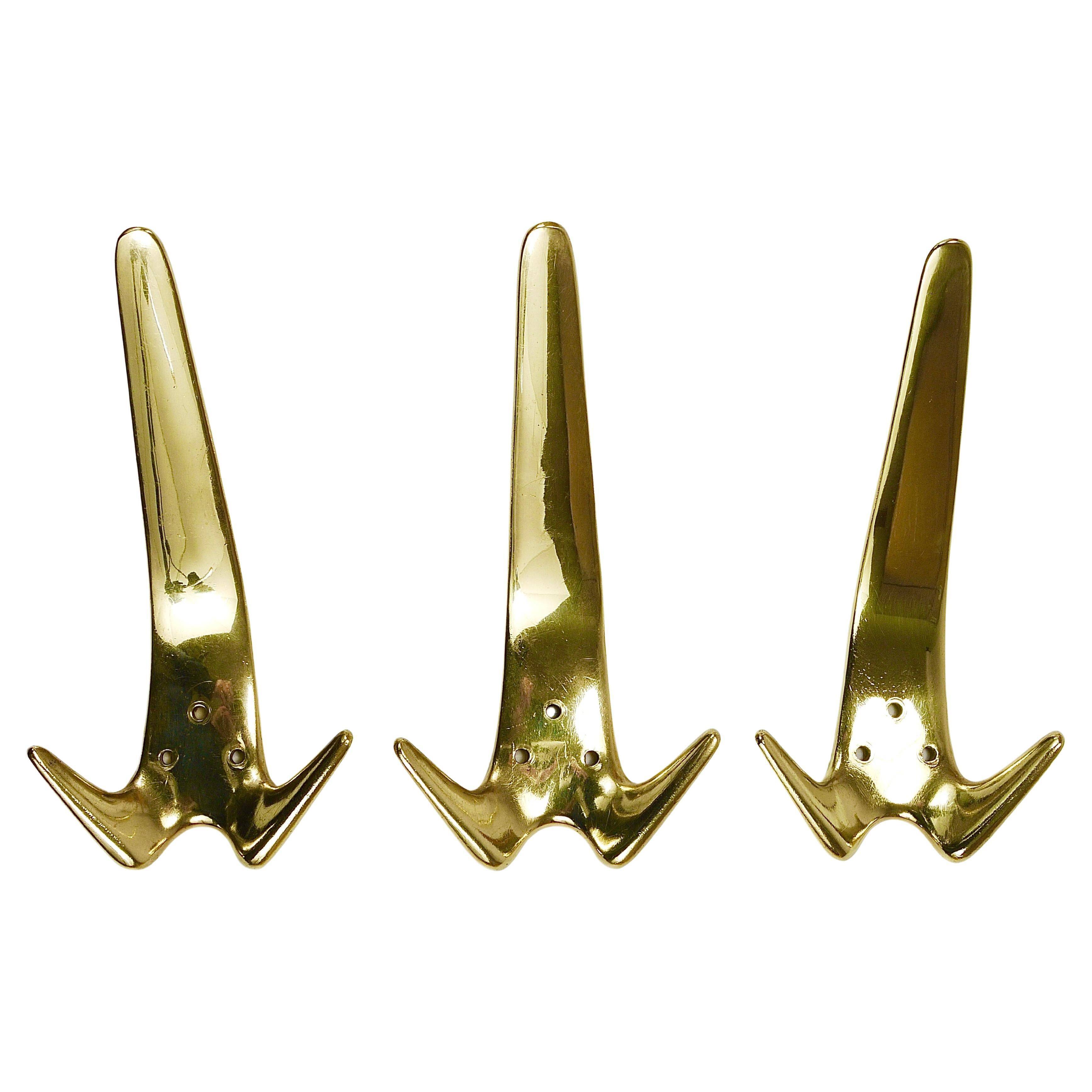 Up to 5 large vintage brass wall hooks by Carl Aubock #4056, Austria, 1950s.