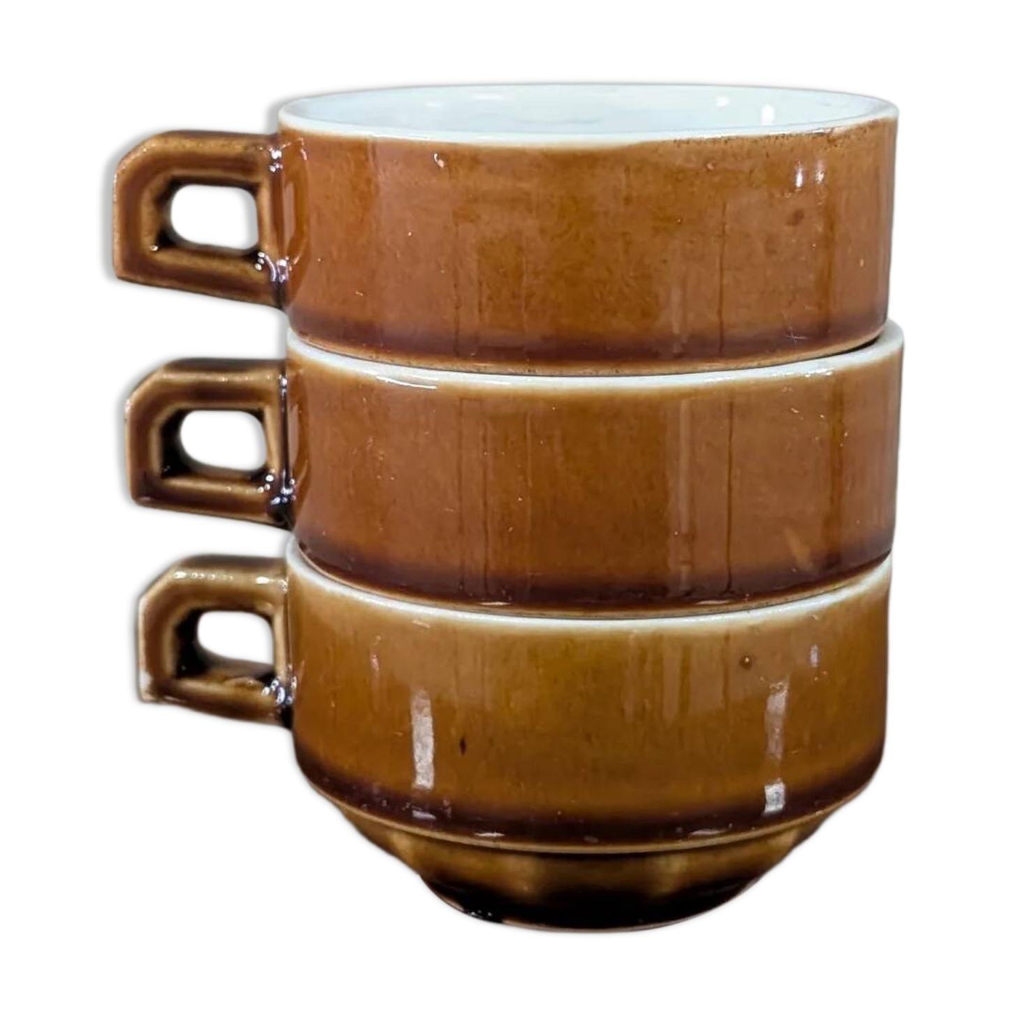 Trio of brown stoneware cups