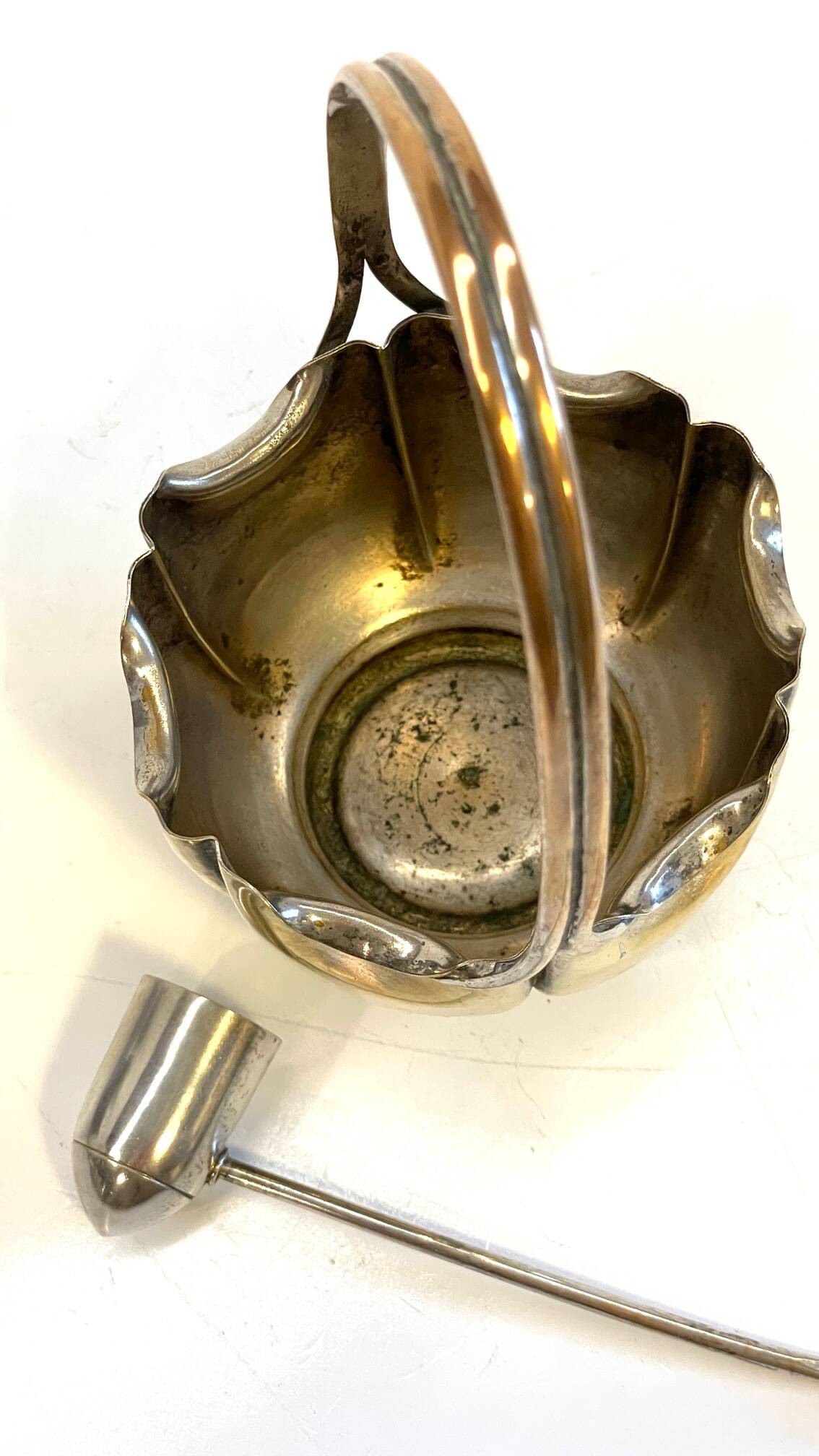 silver metal sugar bowl with gold patina