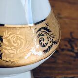 Porcelain table lamp and glass globe