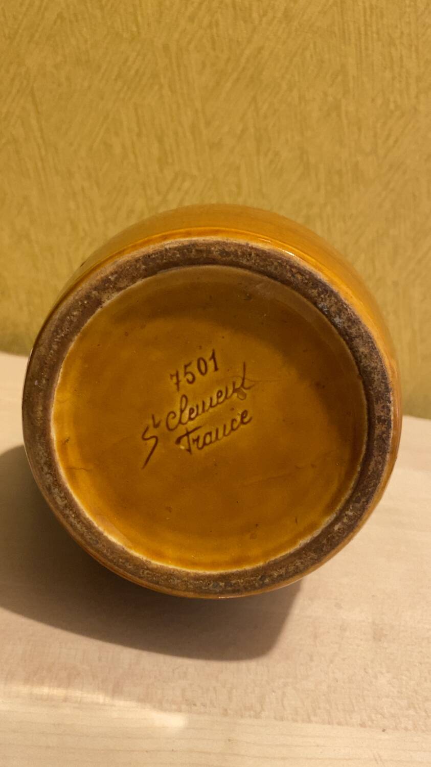 St. Clement brown ceramic pitcher, 1970