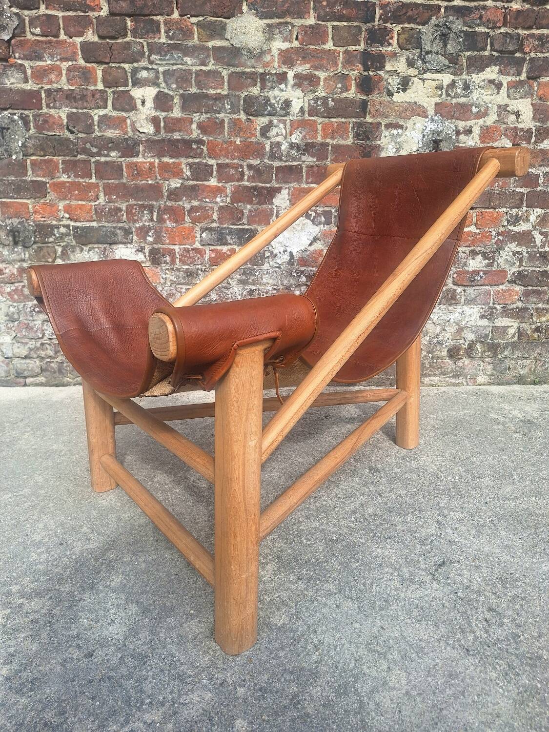 Vintage tripod armchair, designer seating furniture