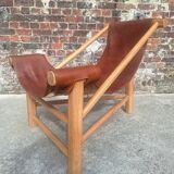 Vintage tripod armchair, designer seating furniture