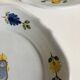 Pair of plates with naive Eastern rooster decoration