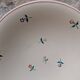 Round serving dish Moulin des Loups Orchies with small flower decoration 25.5cm