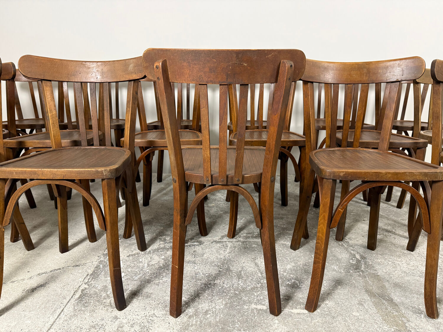 Set of 17 vintage bistro chairs in curved wood — striped seat, be