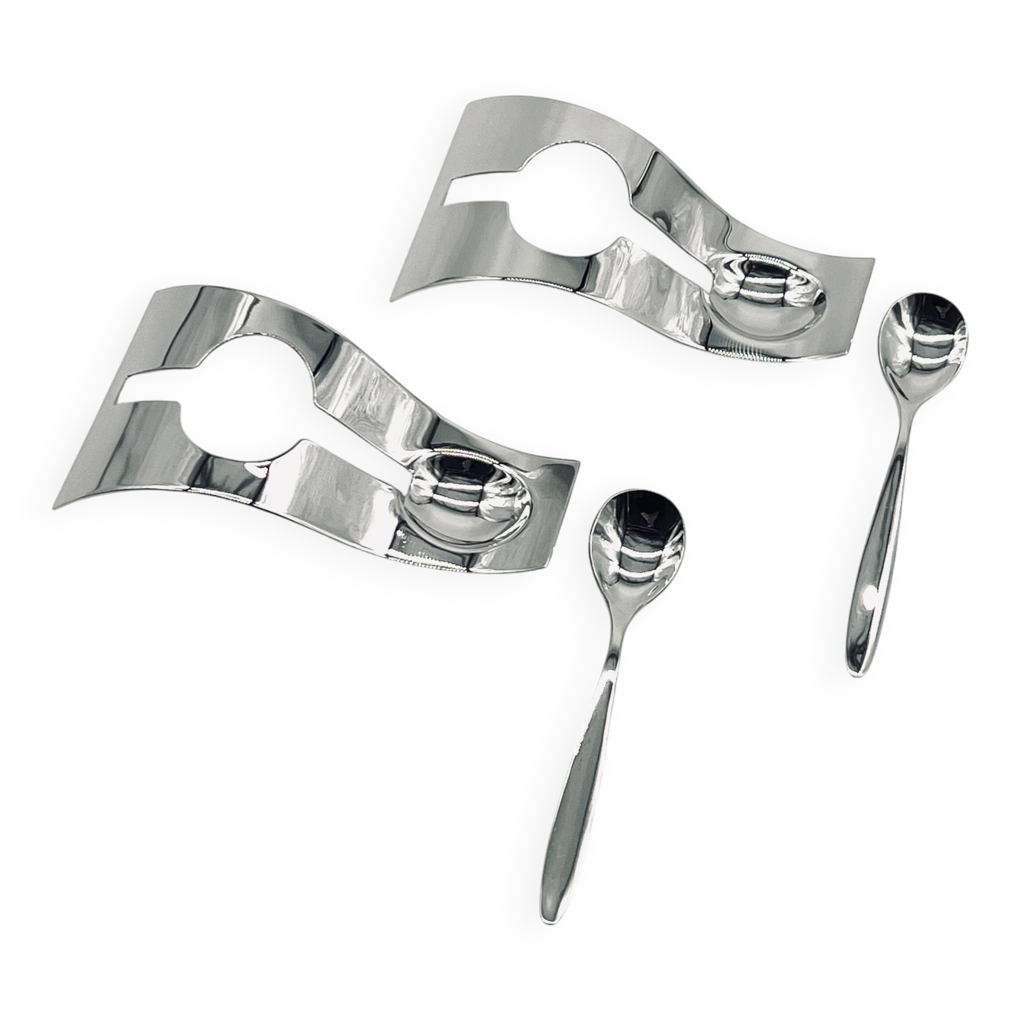 Two egg cups and two stainless steel spoons