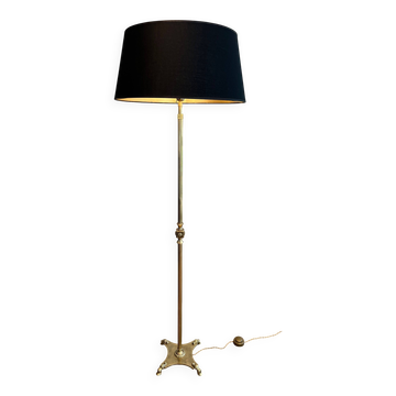 Neoclassical brass floor lamp with claw feet from Maison Jansen.