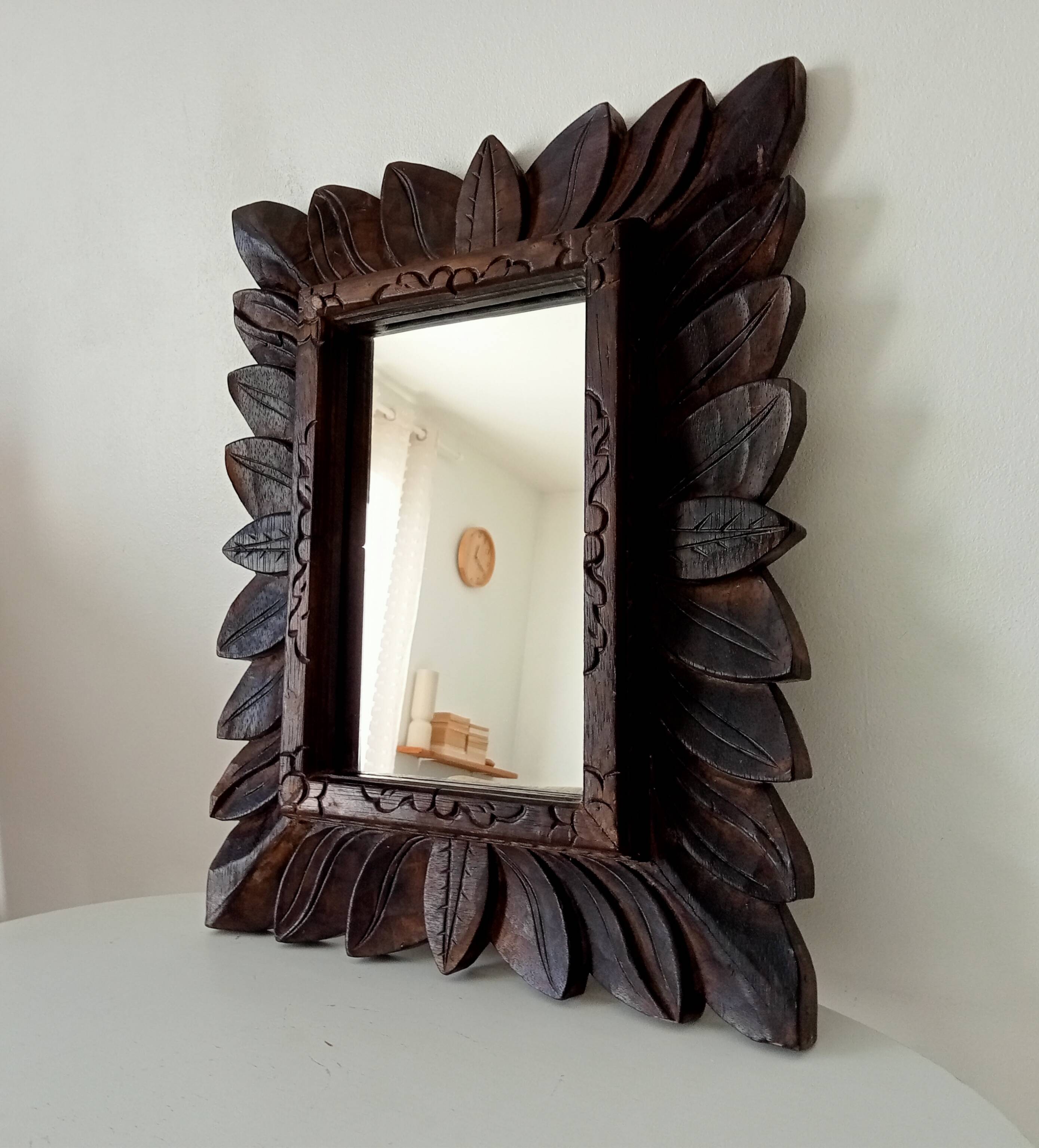 Antique mirror in carved wood