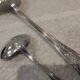 2 Silver-plated soup and sauce ladles with rocaille ribbon decoration