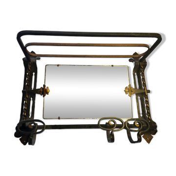 Vintage Art Deco wall-mounted coat and hat rack.