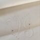 Taie monogrammed embroidered crossing V J