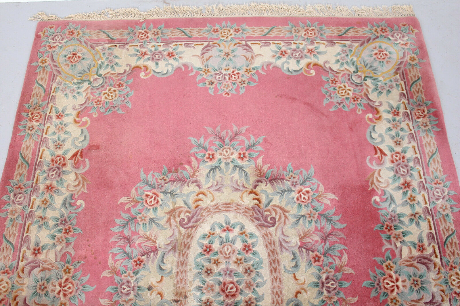 Chinese fringed wool rug with floral pattern on pink background 388x275cm