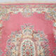 Chinese fringed wool rug with floral pattern on pink background 388x275cm