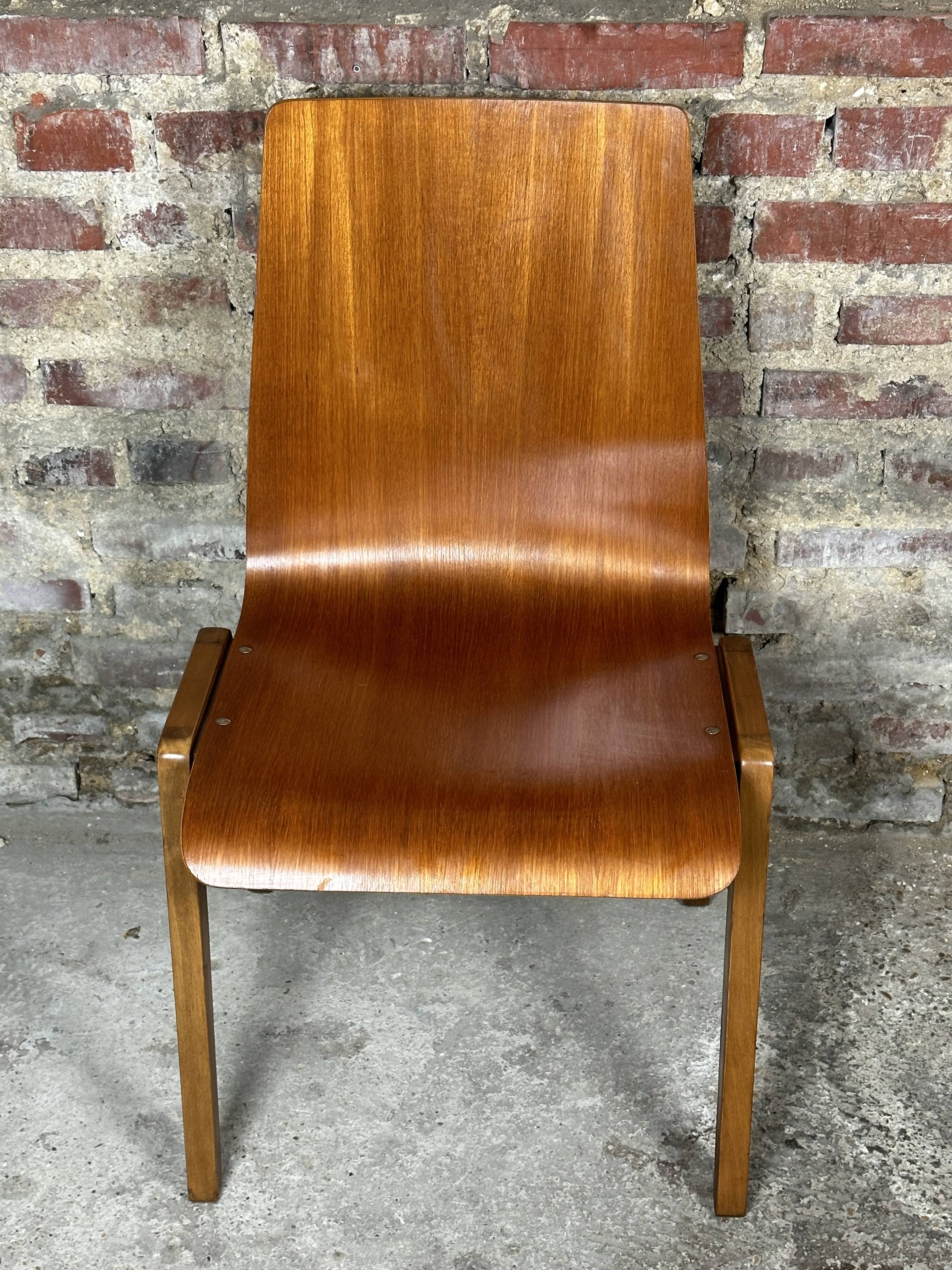 Scandinavian chairs (set of 8) in thermoformed beech from the 1960s.