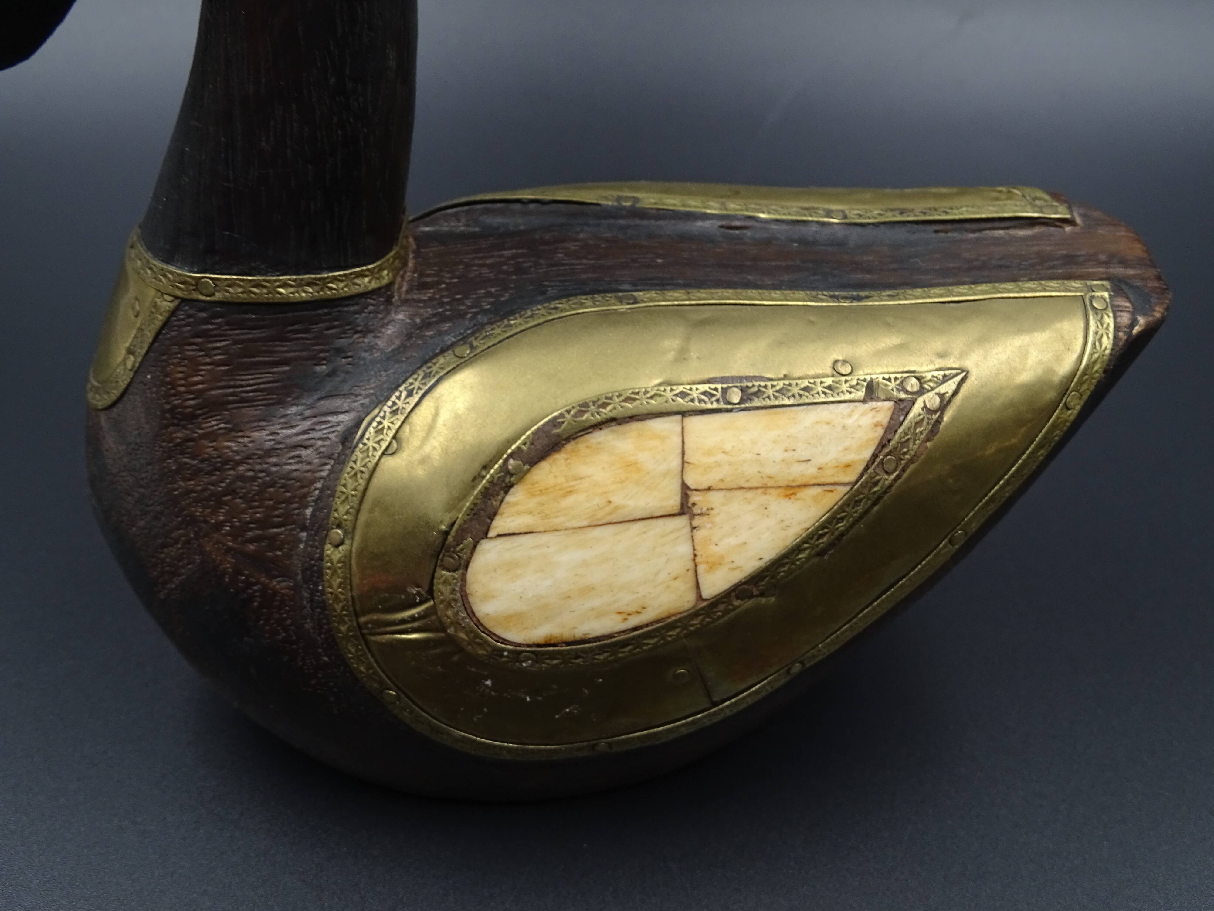 Wooden and brass swan