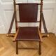 Lot de trois chaises d’officier pliantes bois et cuir