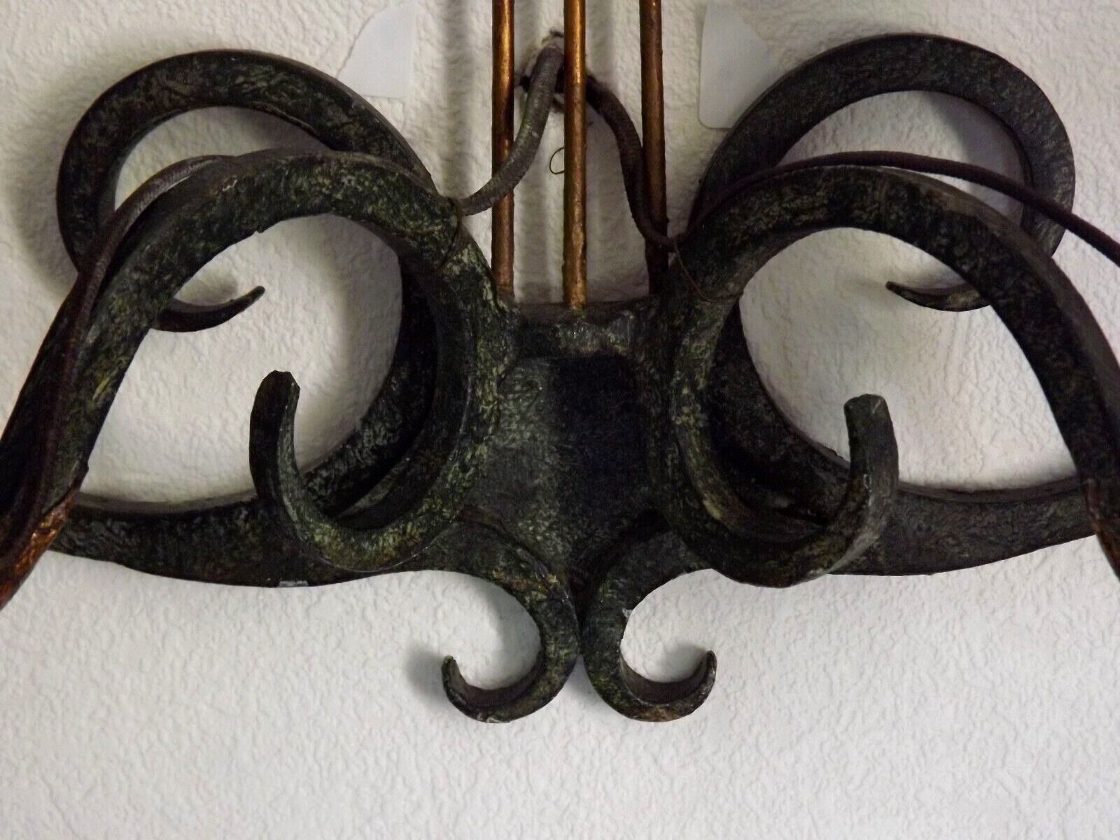 Pair of old antique French double lyre shape green wrought iron wall sconces