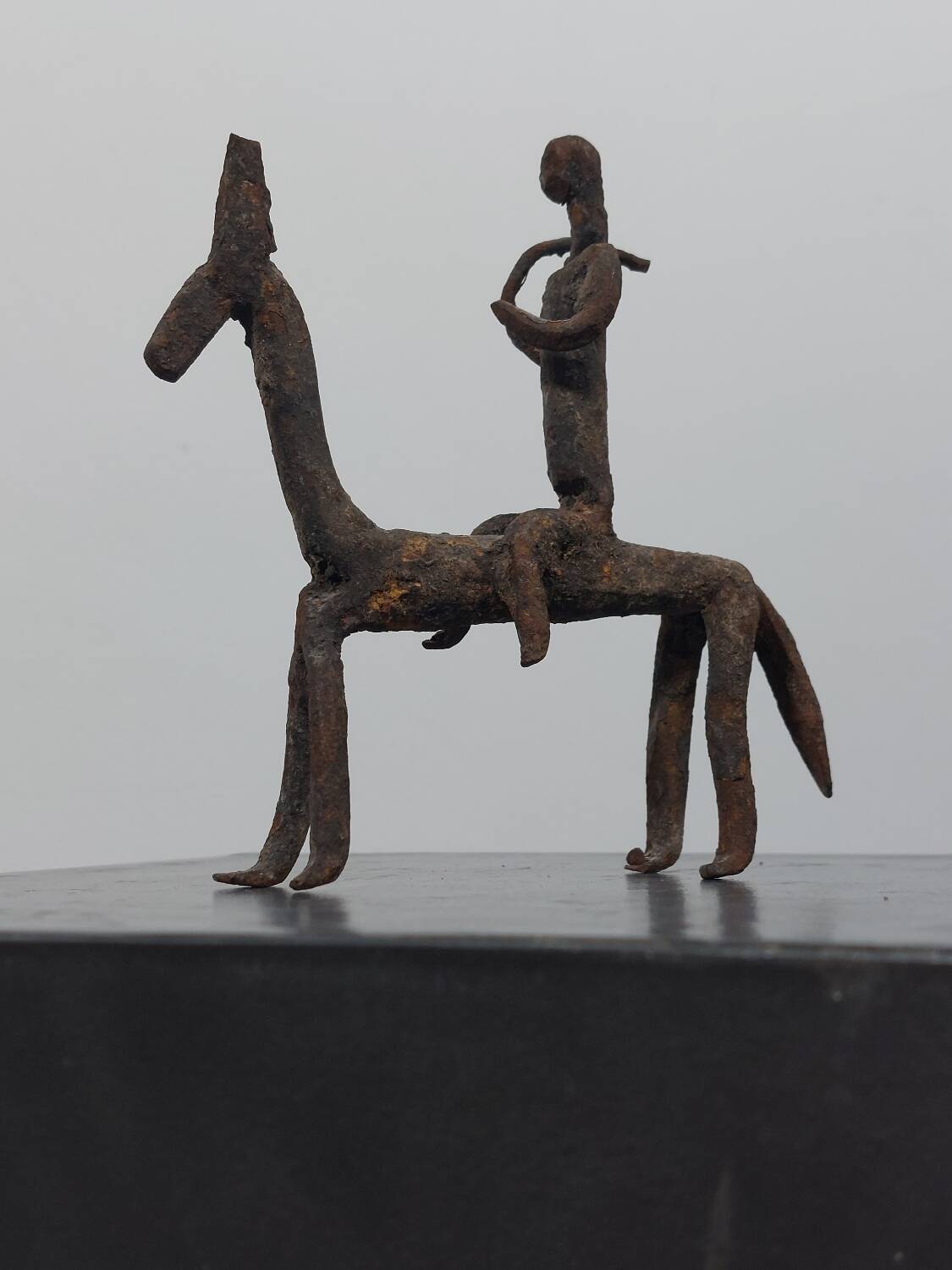 Hand-forged Dogon tribal figurine from naive East Africa.