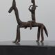 Hand-forged Dogon tribal figurine from naive East Africa.