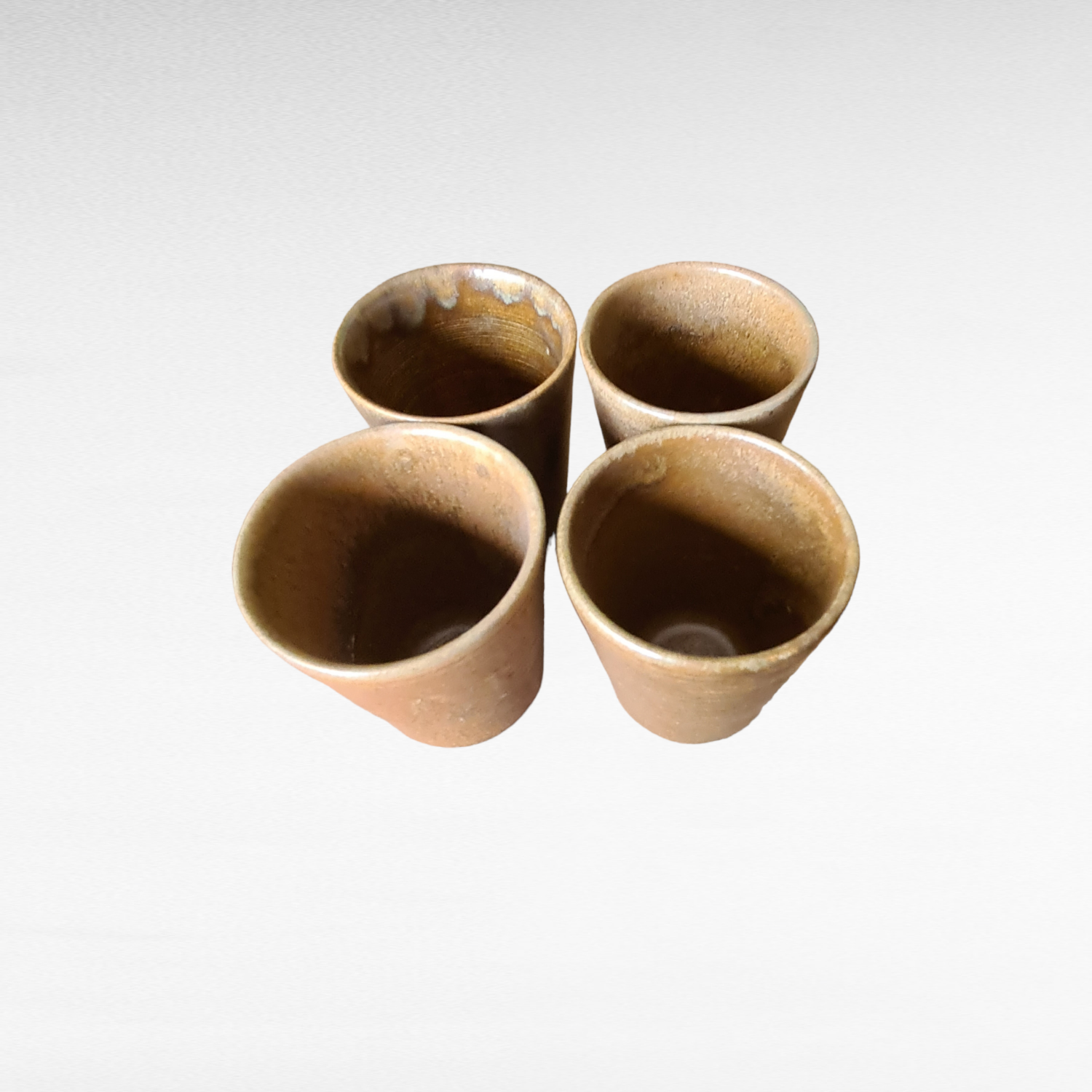 4 sandstone cups