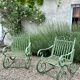 Rocking-chair en fer forgé vert patiné