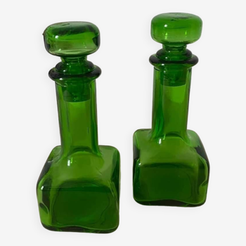 2 green glass bottles with glass stopper