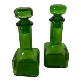 2 green glass bottles with glass stopper