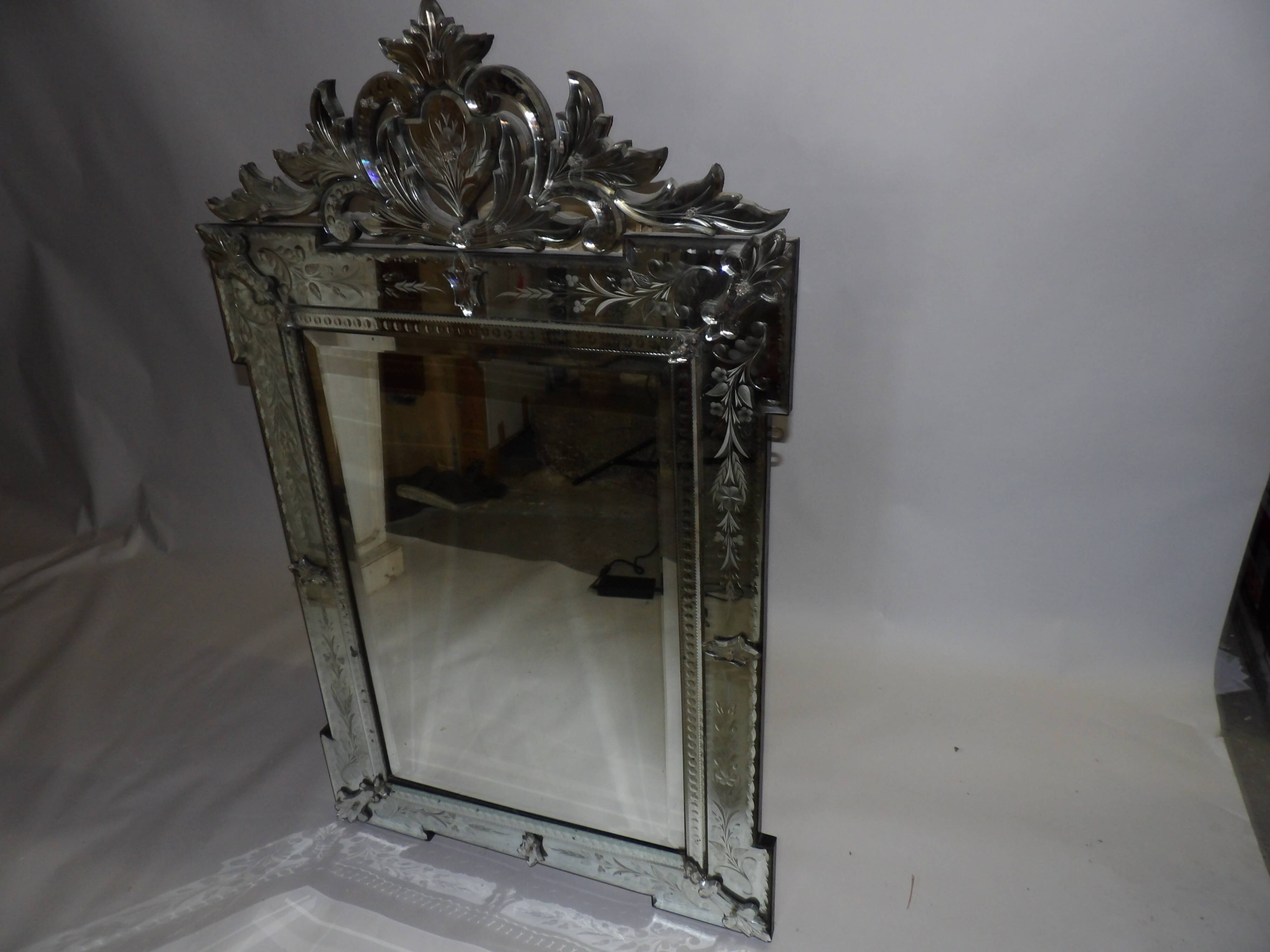 Richly decorated Venetian mirror