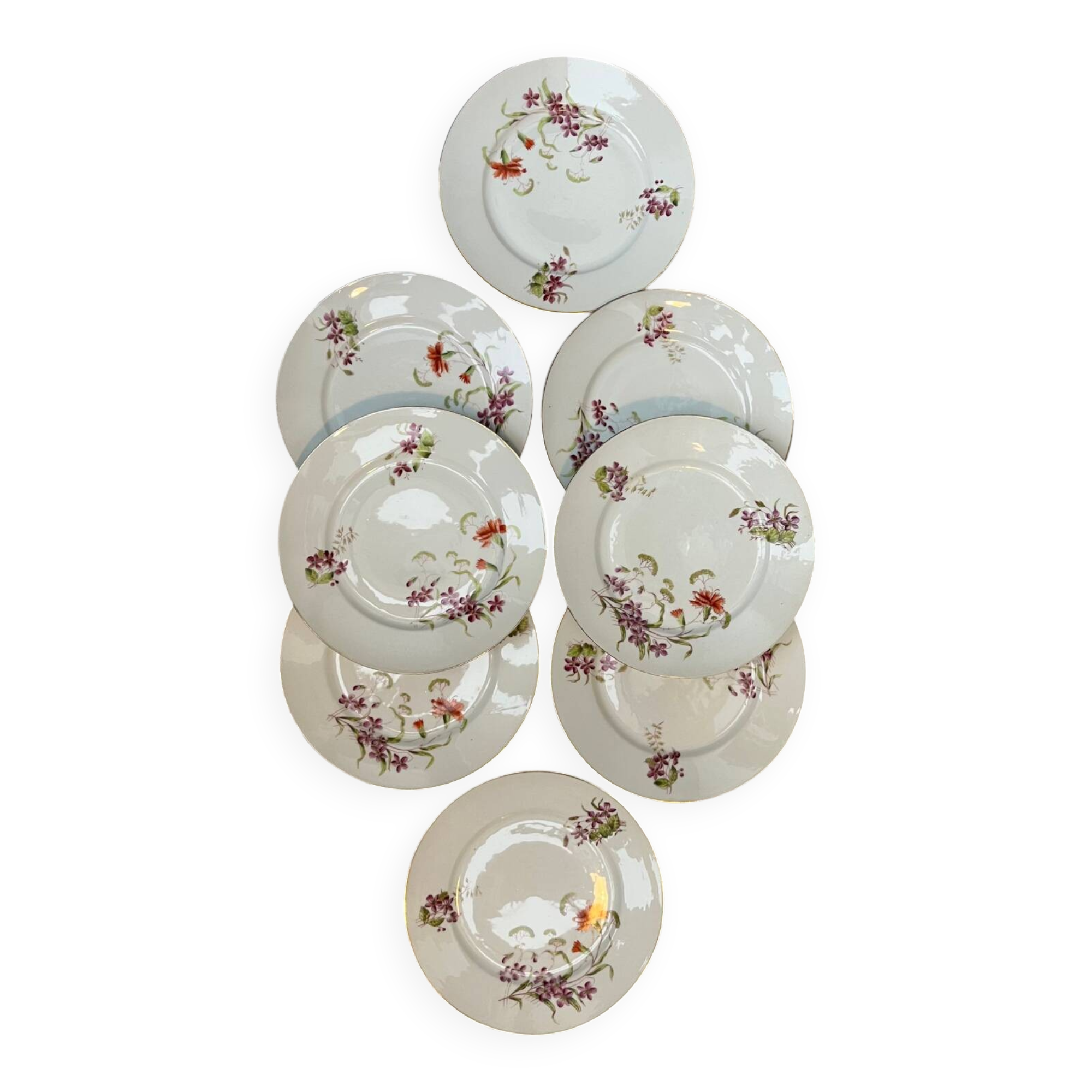 Set of 8 floral porcelain plates from the late 19th century.
