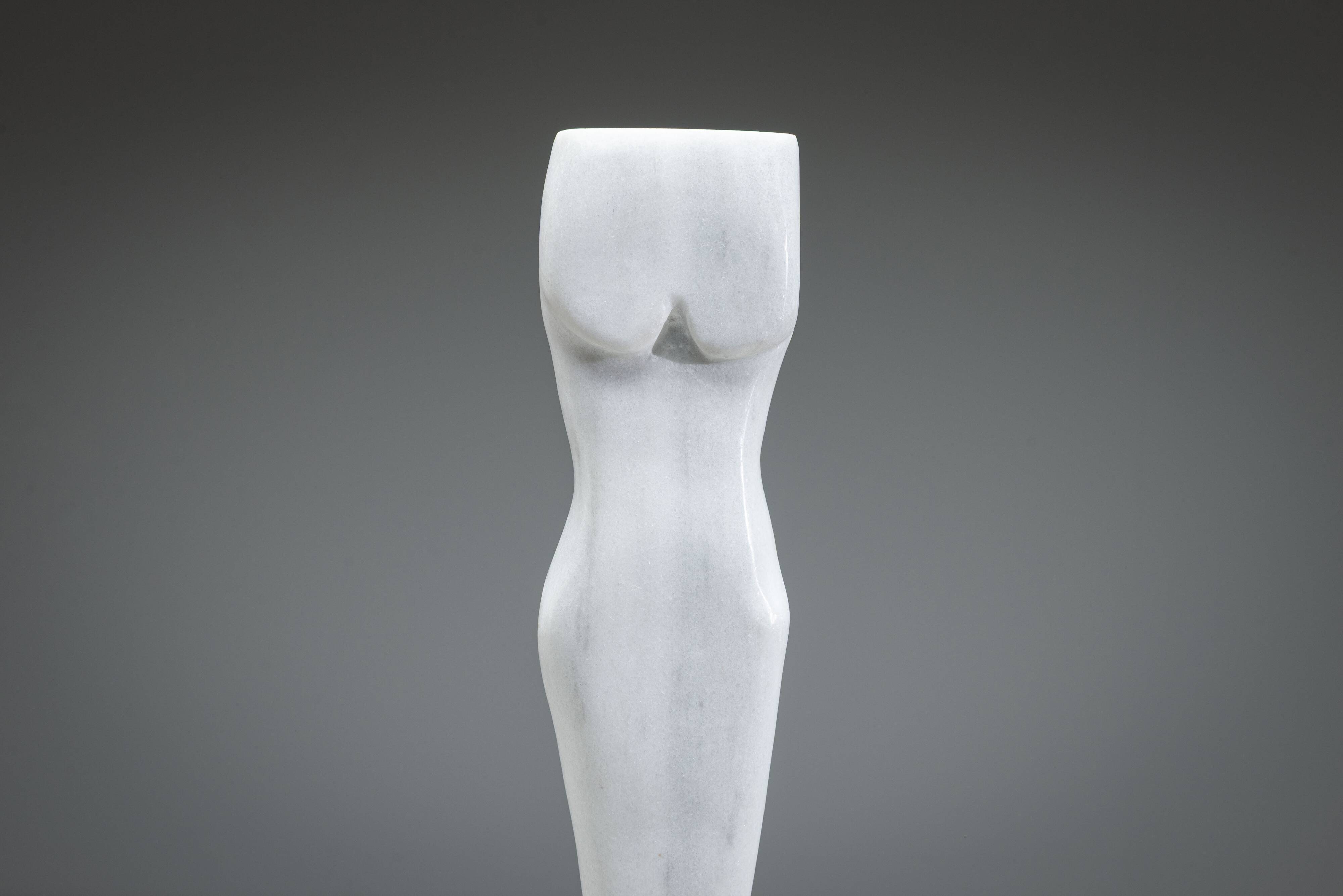 Abstract solid white marble torso