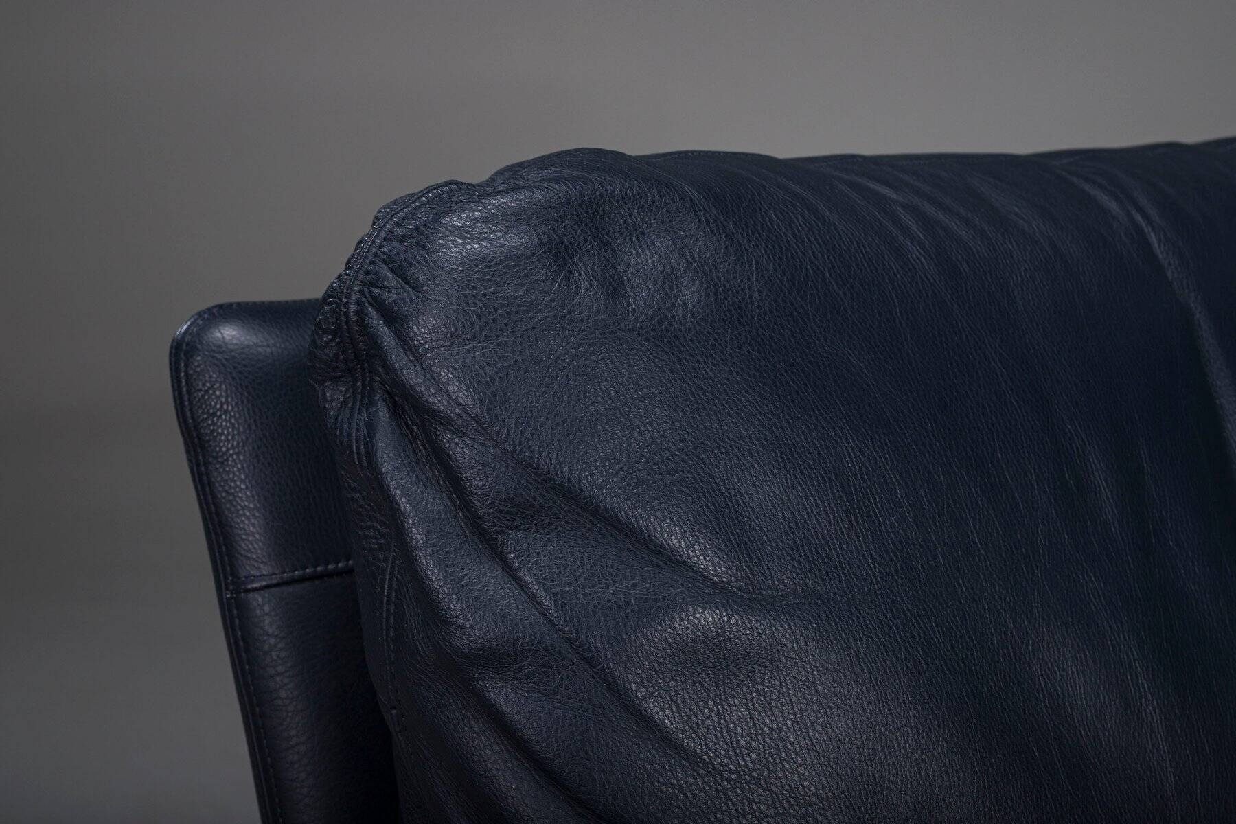 Danish teak and navy blue leather 2-seater sofa from Komfort, 1970s