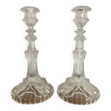 Pair of moulded glass candlesticks, ram heads and masks