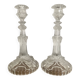 Pair of moulded glass candlesticks, ram heads and masks