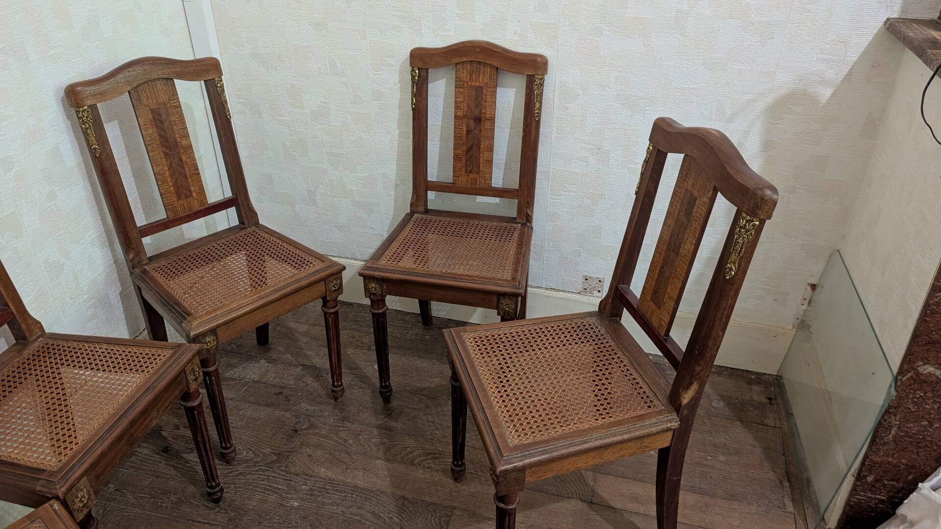 Set of 6 Louis XVI chairs in marquetry wood and caning.