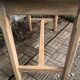 Art Deco farmhouse table made of raw wood.